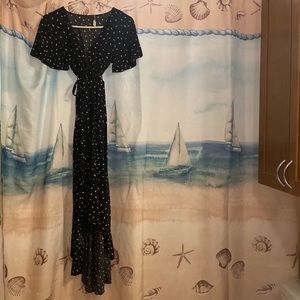 Black dress with white triangular hatches.